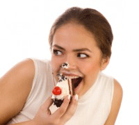 young-woman-eating-cake